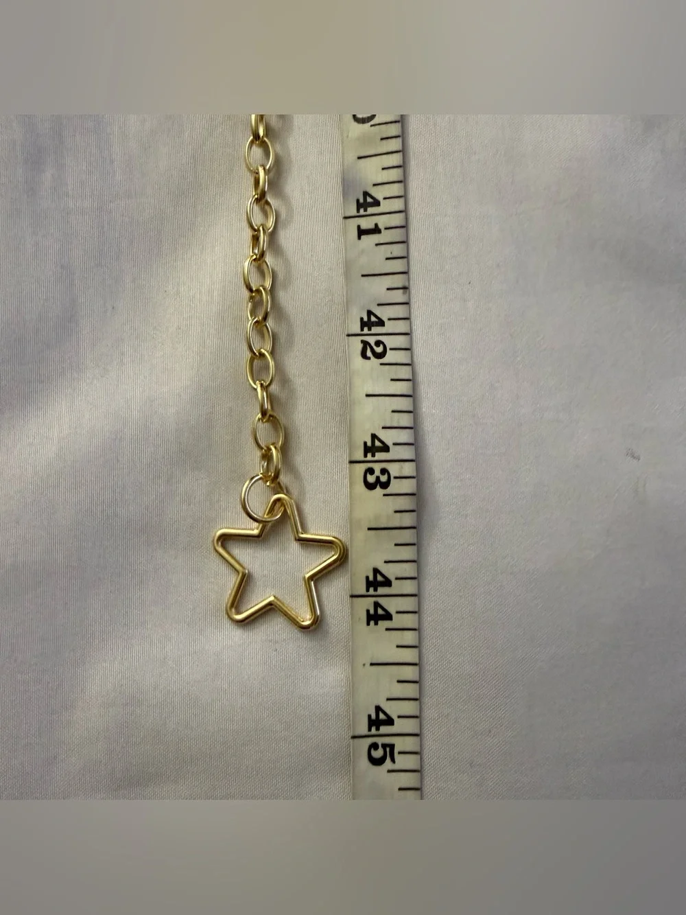 Gold tone star shaped chain belt